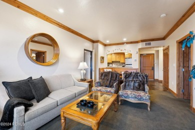 Embrace the charm of alpine living in this elegant second-floor on Homestead Golf Club and Resort in Utah - for sale on GolfHomes.com, golf home, golf lot