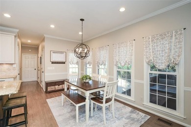 Imagine pulling into the driveway of a stunning traditional on Canongate At Eagle Watch Golf Club in Georgia - for sale on GolfHomes.com, golf home, golf lot