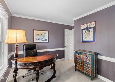 Nestled in St. James Plantation, this spacious home sits on a on Members Club At St. James Plantation in North Carolina - for sale on GolfHomes.com, golf home, golf lot