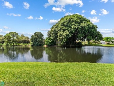 Beautiful 3BR/2BA Home has been totally upgraded. Lake Views on Eastpointe Country Club in Florida - for sale on GolfHomes.com, golf home, golf lot