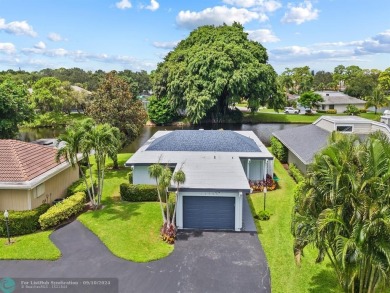 Beautiful 3BR/2BA Home has been totally upgraded. Lake Views on Eastpointe Country Club in Florida - for sale on GolfHomes.com, golf home, golf lot