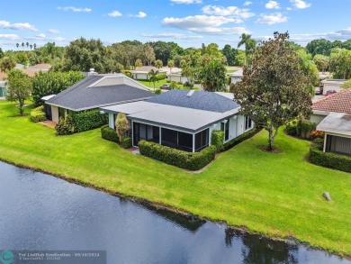 Beautiful 3BR/2BA Home has been totally upgraded. Lake Views on Eastpointe Country Club in Florida - for sale on GolfHomes.com, golf home, golf lot