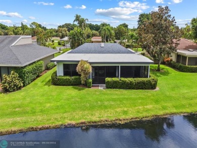 Beautiful 3BR/2BA Home has been totally upgraded. Lake Views on Eastpointe Country Club in Florida - for sale on GolfHomes.com, golf home, golf lot