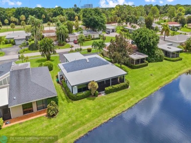 Beautiful 3BR/2BA Home has been totally upgraded. Lake Views on Eastpointe Country Club in Florida - for sale on GolfHomes.com, golf home, golf lot