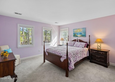 Nestled in St. James Plantation, this spacious home sits on a on Members Club At St. James Plantation in North Carolina - for sale on GolfHomes.com, golf home, golf lot