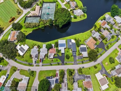 Beautiful 3BR/2BA Home has been totally upgraded. Lake Views on Eastpointe Country Club in Florida - for sale on GolfHomes.com, golf home, golf lot