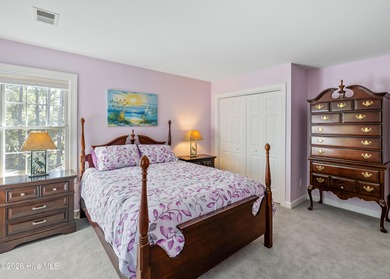 Nestled in St. James Plantation, this spacious home sits on a on Members Club At St. James Plantation in North Carolina - for sale on GolfHomes.com, golf home, golf lot