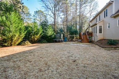 Imagine pulling into the driveway of a stunning traditional on Canongate At Eagle Watch Golf Club in Georgia - for sale on GolfHomes.com, golf home, golf lot