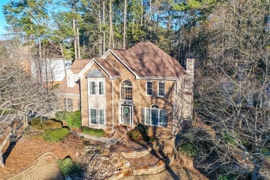 Imagine pulling into the driveway of a stunning traditional on Canongate At Eagle Watch Golf Club in Georgia - for sale on GolfHomes.com, golf home, golf lot