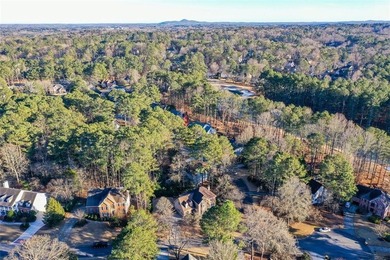 Imagine pulling into the driveway of a stunning traditional on Canongate At Eagle Watch Golf Club in Georgia - for sale on GolfHomes.com, golf home, golf lot