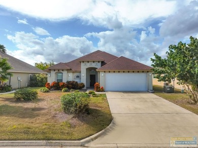 Beautifully crafted 3-bedroom, 2-bath home with a 2-car garage on South Padre Island Golf Club in Texas - for sale on GolfHomes.com, golf home, golf lot