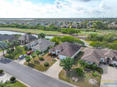 Beautifully crafted 3-bedroom, 2-bath home with a 2-car garage on South Padre Island Golf Club in Texas - for sale on GolfHomes.com, golf home, golf lot