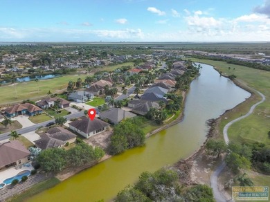 Beautifully crafted 3-bedroom, 2-bath home with a 2-car garage on South Padre Island Golf Club in Texas - for sale on GolfHomes.com, golf home, golf lot
