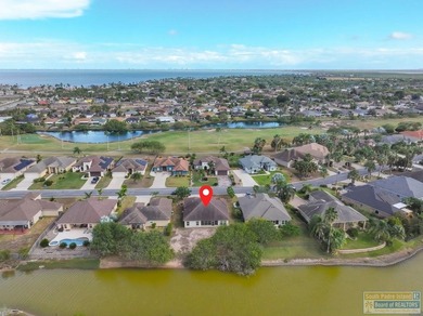 Beautifully crafted 3-bedroom, 2-bath home with a 2-car garage on South Padre Island Golf Club in Texas - for sale on GolfHomes.com, golf home, golf lot