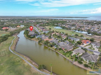 Beautifully crafted 3-bedroom, 2-bath home with a 2-car garage on South Padre Island Golf Club in Texas - for sale on GolfHomes.com, golf home, golf lot