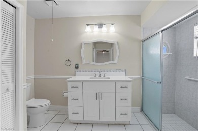 Nestled in the sought-after gated community of Sabal Springs on Sabal Springs Golf and Racquet Club in Florida - for sale on GolfHomes.com, golf home, golf lot
