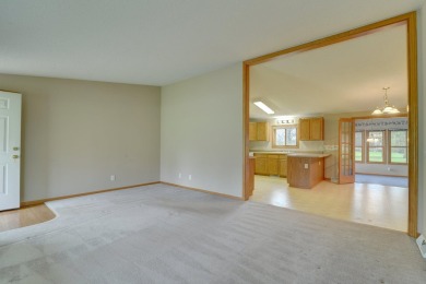 Tee off to easy living perfectly situated on beautiful Country on Country Greens Golf Course in Iowa - for sale on GolfHomes.com, golf home, golf lot