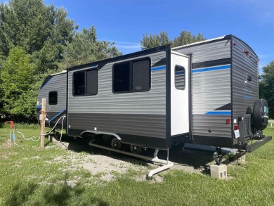 Great camping or building spot in Sugar Springs. Why search for on Sugar Springs Country Club in Michigan - for sale on GolfHomes.com, golf home, golf lot