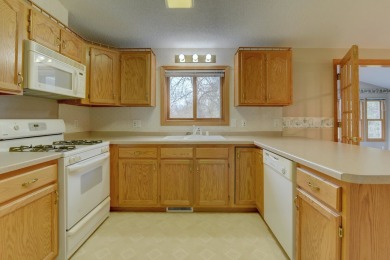 Tee off to easy living perfectly situated on beautiful Country on Country Greens Golf Course in Iowa - for sale on GolfHomes.com, golf home, golf lot