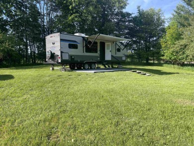 Great camping or building spot in Sugar Springs. Why search for on Sugar Springs Country Club in Michigan - for sale on GolfHomes.com, golf home, golf lot