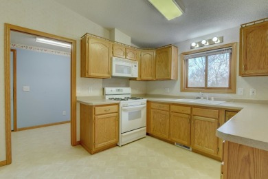 Tee off to easy living perfectly situated on beautiful Country on Country Greens Golf Course in Iowa - for sale on GolfHomes.com, golf home, golf lot