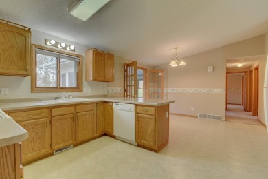 Tee off to easy living perfectly situated on beautiful Country on Country Greens Golf Course in Iowa - for sale on GolfHomes.com, golf home, golf lot
