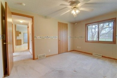 Tee off to easy living perfectly situated on beautiful Country on Country Greens Golf Course in Iowa - for sale on GolfHomes.com, golf home, golf lot