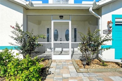 Nestled in the sought-after gated community of Sabal Springs on Sabal Springs Golf and Racquet Club in Florida - for sale on GolfHomes.com, golf home, golf lot