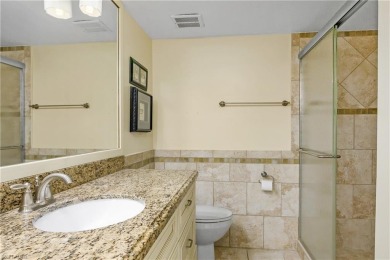 Welcome to this spacious two-bedroom, two-bath condo in the on Imperial Golf Club in Florida - for sale on GolfHomes.com, golf home, golf lot