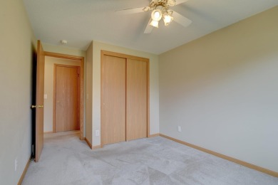 Tee off to easy living perfectly situated on beautiful Country on Country Greens Golf Course in Iowa - for sale on GolfHomes.com, golf home, golf lot