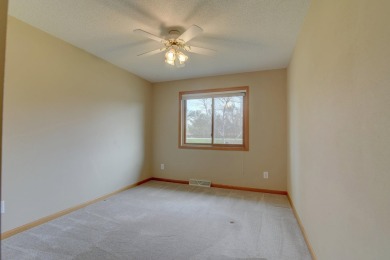 Tee off to easy living perfectly situated on beautiful Country on Country Greens Golf Course in Iowa - for sale on GolfHomes.com, golf home, golf lot