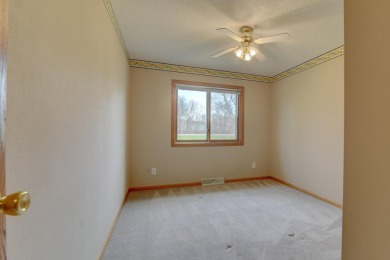 Tee off to easy living perfectly situated on beautiful Country on Country Greens Golf Course in Iowa - for sale on GolfHomes.com, golf home, golf lot