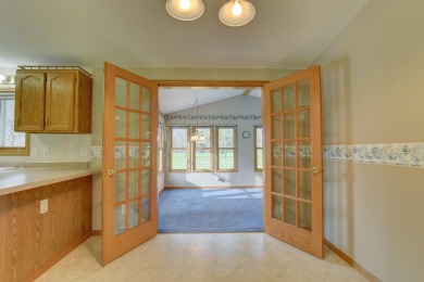 Tee off to easy living perfectly situated on beautiful Country on Country Greens Golf Course in Iowa - for sale on GolfHomes.com, golf home, golf lot