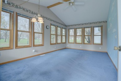 Tee off to easy living perfectly situated on beautiful Country on Country Greens Golf Course in Iowa - for sale on GolfHomes.com, golf home, golf lot