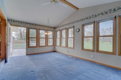 Tee off to easy living perfectly situated on beautiful Country on Country Greens Golf Course in Iowa - for sale on GolfHomes.com, golf home, golf lot