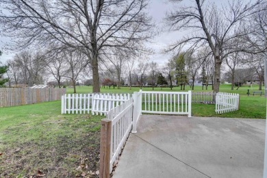 Tee off to easy living perfectly situated on beautiful Country on Country Greens Golf Course in Iowa - for sale on GolfHomes.com, golf home, golf lot