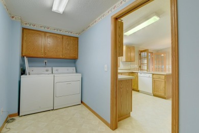 Tee off to easy living perfectly situated on beautiful Country on Country Greens Golf Course in Iowa - for sale on GolfHomes.com, golf home, golf lot