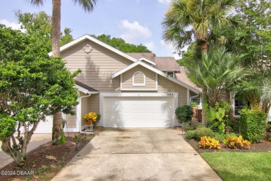 With a private, tranquil water and golf course view, this bright on Spruce Creek Golf Club in Florida - for sale on GolfHomes.com, golf home, golf lot