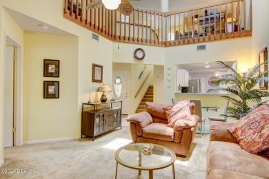 With a private, tranquil water and golf course view, this bright on Spruce Creek Golf Club in Florida - for sale on GolfHomes.com, golf home, golf lot