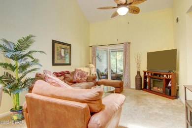 With a private, tranquil water and golf course view, this bright on Spruce Creek Golf Club in Florida - for sale on GolfHomes.com, golf home, golf lot