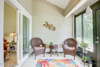With a private, tranquil water and golf course view, this bright on Spruce Creek Golf Club in Florida - for sale on GolfHomes.com, golf home, golf lot