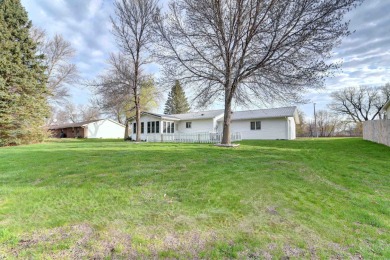 One-owner LOVED 3-bedroom, 2-bathroom home on the GOLF COURSE on Country Greens Golf Course in Iowa - for sale on GolfHomes.com, golf home, golf lot
