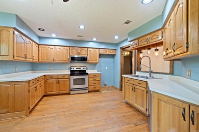 INCREDIBLE opportunity to purchase this home with a 2.25% on DeSoto Golf Course in Arkansas - for sale on GolfHomes.com, golf home, golf lot