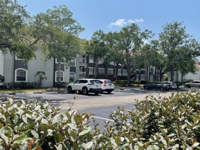 Welcome to this charming second-floor condo located in the heart on Hunters Creek Golf Course in Florida - for sale on GolfHomes.com, golf home, golf lot