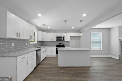 Discover this stunning 3-bedroom, 2.5-bath home with a spacious on Turtle Cove Golf Course in Georgia - for sale on GolfHomes.com, golf home, golf lot