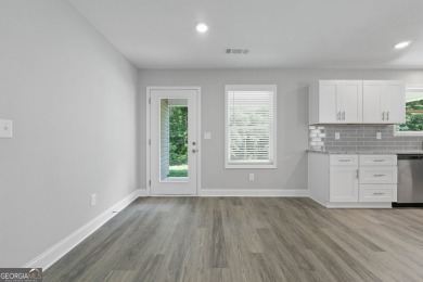 Discover this stunning 3-bedroom, 2.5-bath home with a spacious on Turtle Cove Golf Course in Georgia - for sale on GolfHomes.com, golf home, golf lot