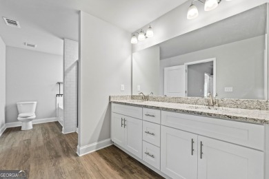 Discover this stunning 3-bedroom, 2.5-bath home with a spacious on Turtle Cove Golf Course in Georgia - for sale on GolfHomes.com, golf home, golf lot