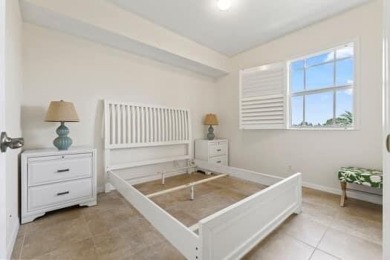 DELIGHT IN THIS SHARP & CONTEMPORARY 3 BEDROOM 2 1/2 BATH CONDO on Gator Trace Golf and Country Club in Florida - for sale on GolfHomes.com, golf home, golf lot
