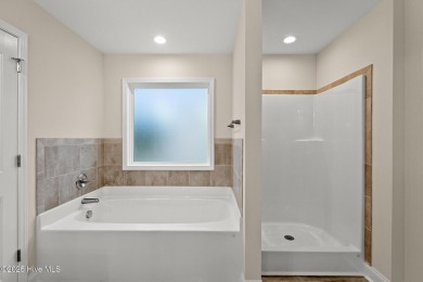 Welcome to The Bakersfield - a brand-new construction home in on Bear Trail Golf Club in North Carolina - for sale on GolfHomes.com, golf home, golf lot