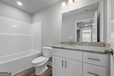 Discover this stunning 3-bedroom, 2.5-bath home with a spacious on Turtle Cove Golf Course in Georgia - for sale on GolfHomes.com, golf home, golf lot